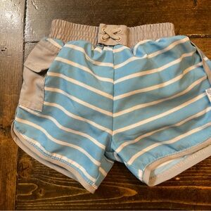 i play. Blue and White Striped Swim Trunks